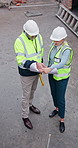 People, reading and document at site for construction, inspection and blueprint for architecture. Above, team or paperwork at worksite for floor plan, upgrade and information for building development