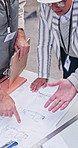 Hands, blueprint and planning with team for construction method, development or layout at site. Floor plan, paperwork and discussion with people for building design requirement, engineer or strategy
