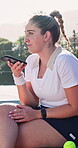 Recording, phone and talk with woman on tennis court for contact, tournament update and fitness. Online game fixture, communication and sports tips with person outdoor for training club and challenge