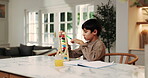 Child, student and counting in home with abacus, practice math and homework for education. Kid, calculate or learning toys at house with notebook, problem solving and number beads for academic study