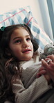 Holding hands, sick child and parent comfort in bed for emotional support, assurance or flu recovery. Health, kid and family with compassion for illness, conversation and healing from virus in home