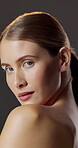 Skincare, face and woman with pride for shine, studio background or hydration with cosmetic benefits. Portrait, glow and person with healthy skin, beauty and confident with dermatology in Canada