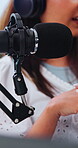 Podcast, hosting or microphone with content creation, sound setup or voice equipment for live stream. Digital, woman or influencer with recording technology, audio system or vocal gear for broadcast.