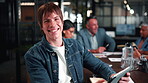 Leader, face and man with tablet in boardroom, confident and career development in marketing agency. Social media manager, laughing and happy person with team, online and research on web in office