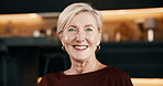 Wellness, face and old woman in house with smile, positive attitude or optimistic for weekend break. Happy, portrait or senior person in lounge with good mood, confidence or satisfaction on day off. 