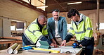Architecture, team or manager in workshop with blueprint, building plan or feedback on furniture project. Discussion, men or contractor with paper, operation report or director evaluation in woodwork