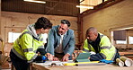 Architecture, team or manager in factory with document, building plan or feedback on furniture project. Talking, men or contractor with blueprint, operation report or director evaluation in woodwork.
