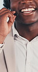 Call center, mic and mouth with guidance, contact us and investment advice in crm service.Talking, man and finance consultant with headset, online banking and loan support on studio background.