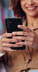 Hands, woman and relax at house with phone, social media and browsing website for comedy video. Smile, female person and laugh in home with mobile, reading funny meme and streaming for weekend break