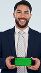 Face, businessman and phone in studio with green screen, advertising and website for real estate. Portrait, realtor and mobile with mockup space, presentation and property auction on white background