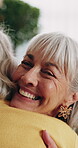Happy, friends and senior woman with hug for support, care or appreciation for lifelong relationship. Love, elderly people and embrace in retirement home for visit, reunion or talking with connection