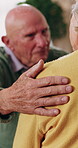 Friends, hand and senior people with support, care and appreciation for lifelong relationship. Empathy, elderly woman and man in retirement home for visit, compassion or talking with connection