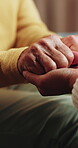 Holding hands, comfort and caregiver with senior person, help and sympathy for patient or healthcare. Assisted living, elderly care and empathy with gesture, compassion and nurse with support 