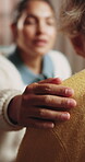 Hand, comfort and caregiver with senior person, help and sympathy for patient or healthcare services. Assisted living, nurse and empathy for old woman, compassion and support with gesture and care