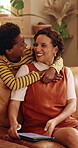 Smile, son and tablet with mother hug in home living room for bonding, love or security. African family, connection and funny with boy embracing happy woman in apartment for development or support