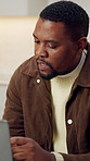 Black man, frustrated and remote work with laptop for financial management issue, budget report or error. Stress, freelancer and person in house with tech, account planning mistake or glitch review