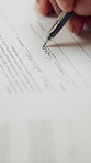 Hands, person and writing approval with document, legal application and estate settlement. Title deed, paperwork and consent with contract for asset protection, inheritance beneficiary and testament