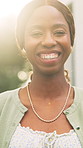 Smile, backyard and face of black woman in new home for real estate development, laugh and relax. Homeowner, property investment and portrait with happy person outdoor for flare, security and joke