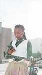 Bicycle, commute and phone with businesswoman in city for eco friendly transportation to work. App, bike and search with employee person outdoor for zero emission travel to location in urban town
