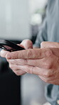 Man, hands and typing in office with phone, work email and connection for text message notification. Person, browsing and tech in business with website, mobile chat and download application for job.