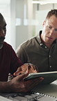 Tablet, team and men planning in office with marketing proposal, project idea or suggestion. Tech, collaboration and business people talking for ad campaign development, online research or review