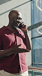 Happy, business and black man with phone call for discussion or proposal in office building. Businessman, laughing or smile with smartphone for chatting, negotiation or communication in workplace