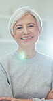 Wellness, face and senior woman with arms crossed, positive attitude and optimistic for weekend break. Portrait, confidence and elderly person with flare, happy moment and good mood in retirement.