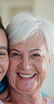 Face, nurse and old woman with smile, care and support with healthcare in house for assisted living. Retirement, happy caregiver and person with medical help, trust and connection with homecare