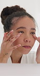 Skincare, mirror and woman in bathroom for hydration benefits, glow or wellness for beauty. Natural cosmetics, person and reflection in home for facial moisturizer, dermatology or touch for self care