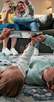Gaming, tablet and relax with children in home for drawing app, support and bonding. Connection, digital sketching and online entertainment with parents and kids in living room of family house