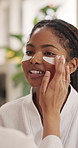 Friends, happy and woman with eye mask in home for dark circles, beauty and bonding on weekend. Morning, talking and people with pads for wellness, pamper or skincare treatment together for self care