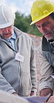 Civil engineer, teamwork and men with blueprint on building site, writing or planning for renovation. Outdoor, discussion and mature people with document, project management and architect with notes