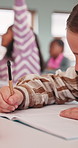 Writing, education and hands of child in classroom at high school for exam, test or quiz. Notes, learning and girl student studying with academic assessment, knowledge or essay summary on campus.