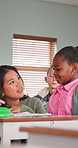 Question, help and teacher with girl in classroom for assistance, learning and explain lesson. Teaching, woman and child with assignment answer for education, understanding and development at school