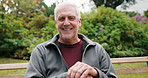 Happy, outdoor and face of senior man with positive attitude, relax and good mood on weekend. Smile, confident and portrait of elderly person with pride for retirement or pension on holiday in nature