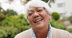 Laugh, outdoor and face of senior woman with positive attitude, relax and good mood on weekend. Happy, confident and portrait of elderly person with pride for retirement or pension in nature.