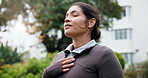 Mindfulness, meditation and woman at park, calm and spiritual awareness for mental health in nature. Outdoor, fresh air and happy person on break, breathing and healing with inner peace and wellness