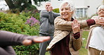 Stretching, instructor and senior people outdoor for wellness, exercise and warm up for mobility. Retirement, garden and woman with elderly group for fitness session, balance and movement for health