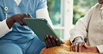 Nurse, tablet and old woman on couch with hands, advice and medical consultation in senior care. Conversation, homecare and elderly person on sofa with caregiver, digital app and health insurance