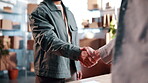 Warehouse, small business and men with handshake for supply chain, welcome or supplier partnership. Logistics, people and shaking hands for management, agreement or delivery startup for distribution