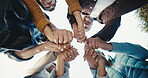 Motivation, low angle and people outdoor with holding hands, victory and team support with unity. Success, solidarity and group with circle, collaboration gesture and encouragement in milestone reach