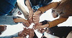 Support, low angle and people outdoor with holding hands, victory and team motivation with unity. Success, solidarity and group with circle, collaboration gesture and encouragement in milestone reach