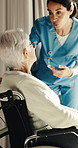 Woman, caregiver and senior patient in wheelchair for support, elderly care or trust in old age home. Medical professional, nurse and person with a disability for consulting, health advice or help