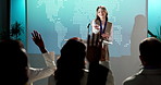 Woman, presentation and podium with hands raised for question, interaction or feedback in seminar. Female person, speaker and request with crowd, audience or answer for response in business workshop