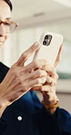 Woman, hands and typing with phone in office for social media, communication or network connection. Female person, employee or texting with smartphone for conversation or chatting app in workplace