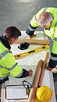 Above, people and discussion with blueprint for architecture, explain design or project with manager. Team, talk and review floor plan at construction site with collaboration, renovation and advice.