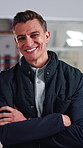 Construction, face and man on site with arms crossed, contractor or about us in building industry. Ambition, engineer or architect with portrait, confidence or developer in industrial profession.
