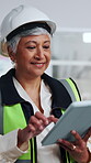 Construction, development and tablet with happy woman on building site for project management. App, architecture and planning with mature property developer on worksite for civil engineering research