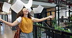 Business, celebration or happy woman with documents in air for project completion, done or finished. Excited, female person or throwing paperwork with smile in office hallway for good news or success