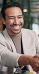 Handshake, happy and businessman with manager in office with deal, agreement or congratulations. Smile, professional and corporate employees shaking hands for meeting, partnership or collaboration.
